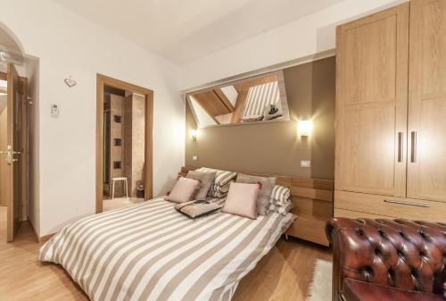 Ubaldi Luxury Rooms - Tap to explore photos