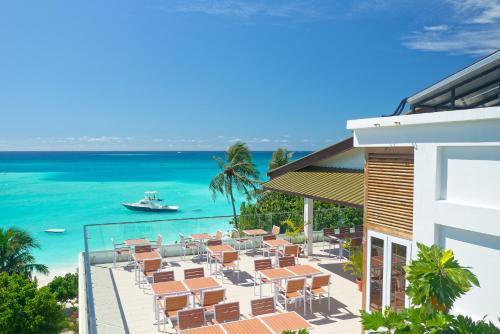 Luau Beach Inn, Maldives - Tap to explore photos