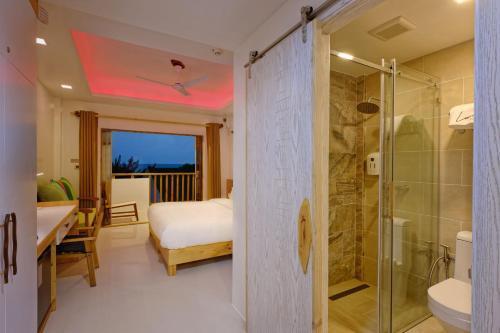 Luau Beach Inn, Maldives - Tap to explore photos