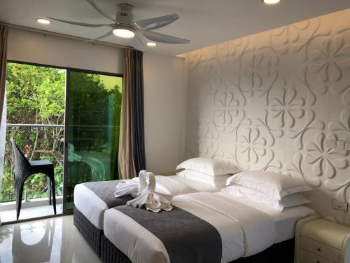 Wow Inn Keyodhoo Room Type - Deluxe Double Room with Balcony and Sea View Wow Inn Keyodhoo Room Type - Deluxe Double Room with Balcony and Sea View
