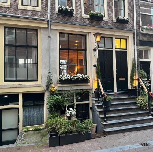 The Enlightened House Luxury Suites - Tap to explore photos