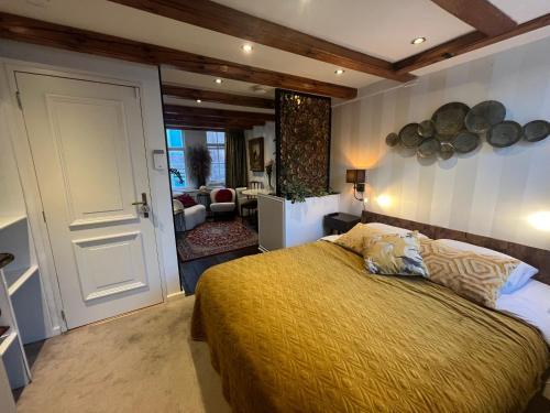 The smallest hotel in Amsterdam - Tap to explore photos