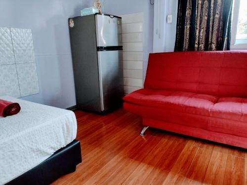 Mango Tree Guestroom - Tap to explore photos