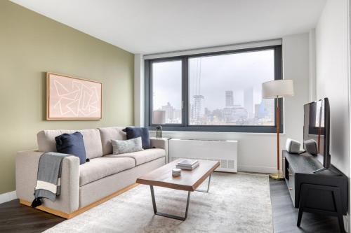 1BR in Hip E Village w Doorman Gym NYC-150 - Tap to explore photos