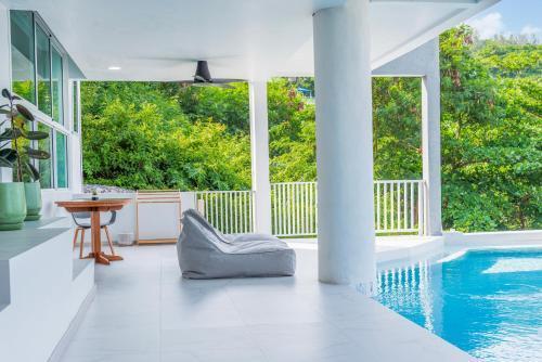 Replay Pool Villa - Tap to explore photos