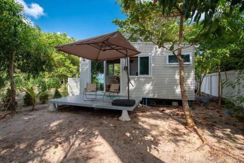 Brand New Beachfront & Secluded Tiny House - Tap to explore photos