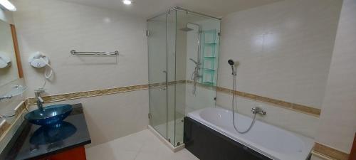 City Garden Pattaya - 2br Suite, 76sqm - Tap to explore photos