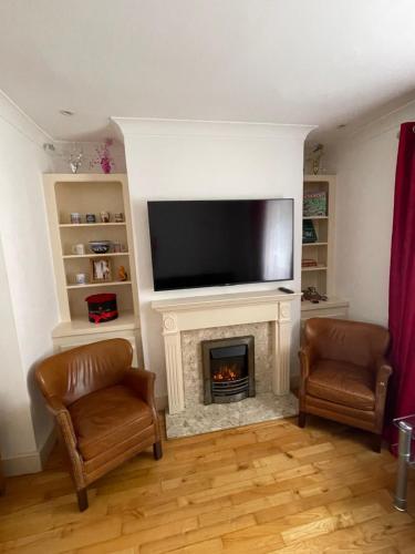 Rooms in shared house in Kensington - Tap to explore photos