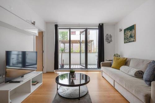 A modern two bedroom flat with private parking - Tap to explore photos