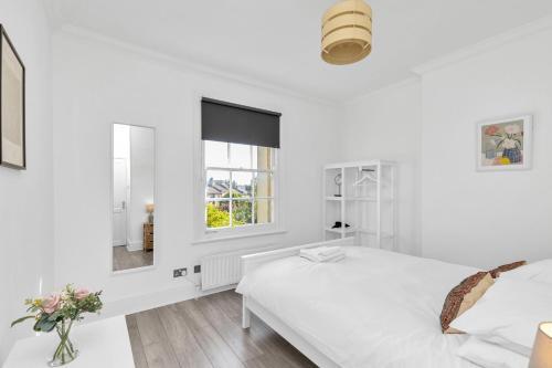 Modern Two Bedroom Apartment with Free Parking! - Tap to explore photos