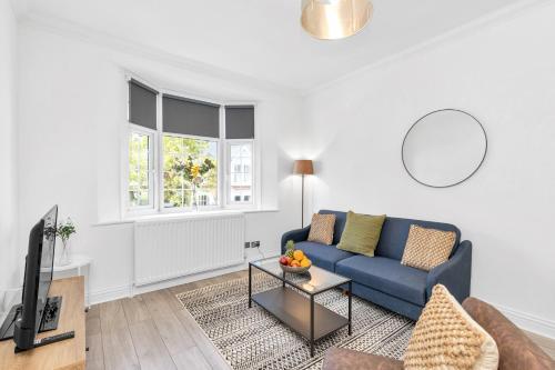 Modern Two Bedroom Apartment with Free Parking! - Tap to explore photos