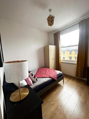 Stay in Hackney apartment - Tap to explore photos