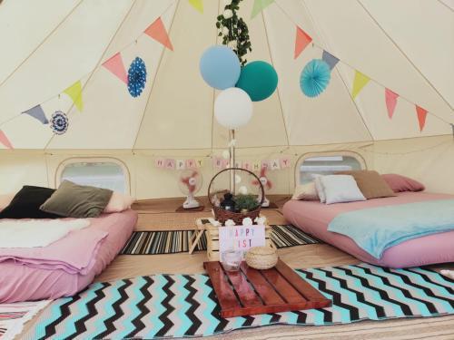 Glamping Kaki - Medium Bell Tent - Tap to explore photos