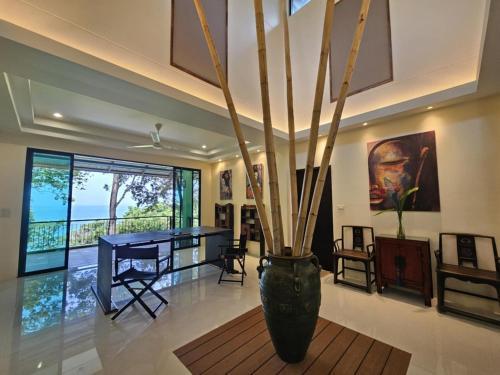 Beachfront villa in Rawai - Tap to explore photos