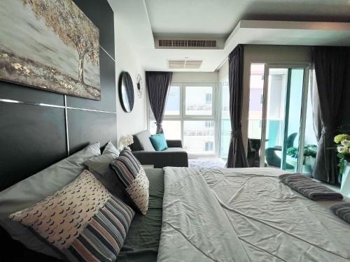 Cosy Beach View Condominium - Tap to explore photos