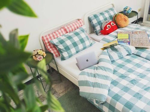 Single Beds, Private Bath & Balcony, Shared Kitchen with Local Family by Pillows & Purrs - Tap to explore photos