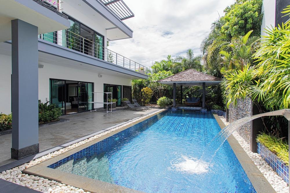 Tropical Haven 4 Bedroom Pool Villa - Tap to explore photos