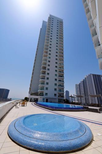 EliteRetreat - SeaView - Gym & Pool Access - Reem Island - Tap to explore photos