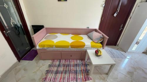 Nice Shared Studio Next to AUH Airport males - Tap to explore photos