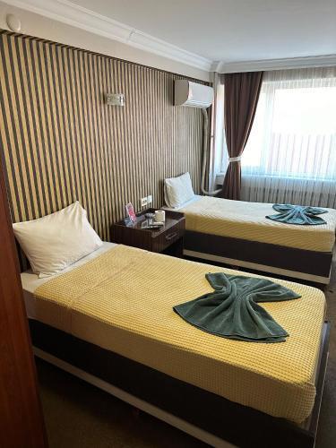 Hotel Metropol 1 Room Type - Twin Room with Private Bathroom