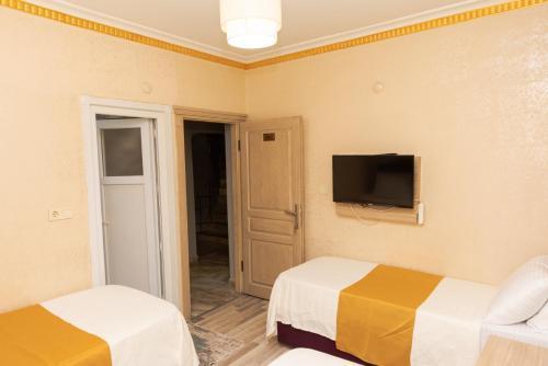 Öz Dünya Suites Apartment - Tap to explore photos