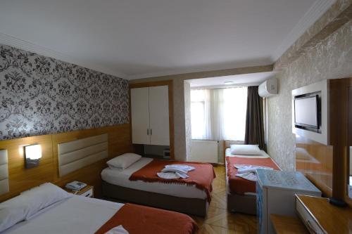 özbek hotel butik - Tap to explore photos
