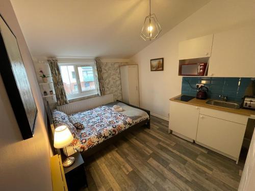 City Nest Studio #3 Room Type - One-Bedroom Apartment