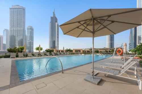 Silkhaus Comfy 1BR by Burj Khalifa with Balcony - Tap to explore photos