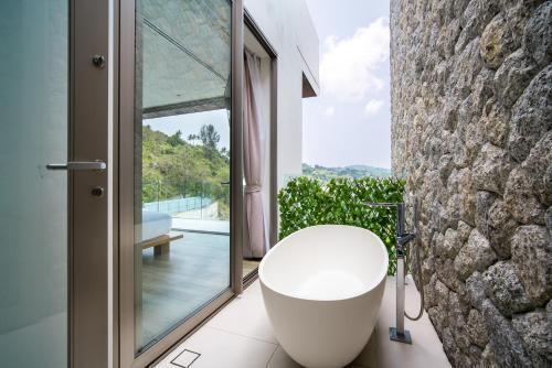 Phuket Seaside Villa 3 - Tap to explore photos