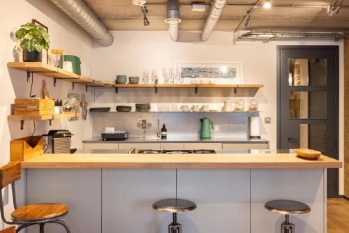 Unique, Loft-Style Apartment - Tap to explore photos