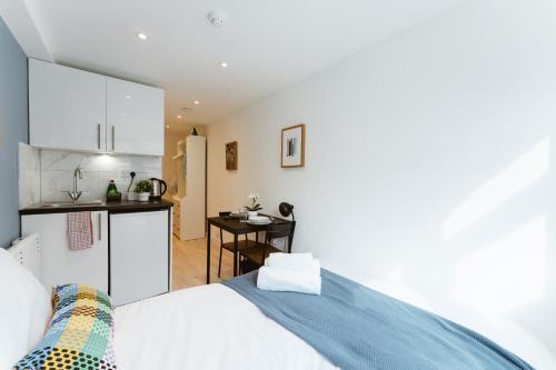 The Finsbury Park Star Apartments - Tap to explore photos