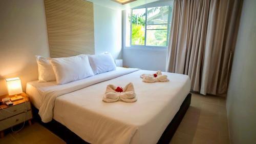 Tulum Villa Resort Koh Samui - Tap to explore photos