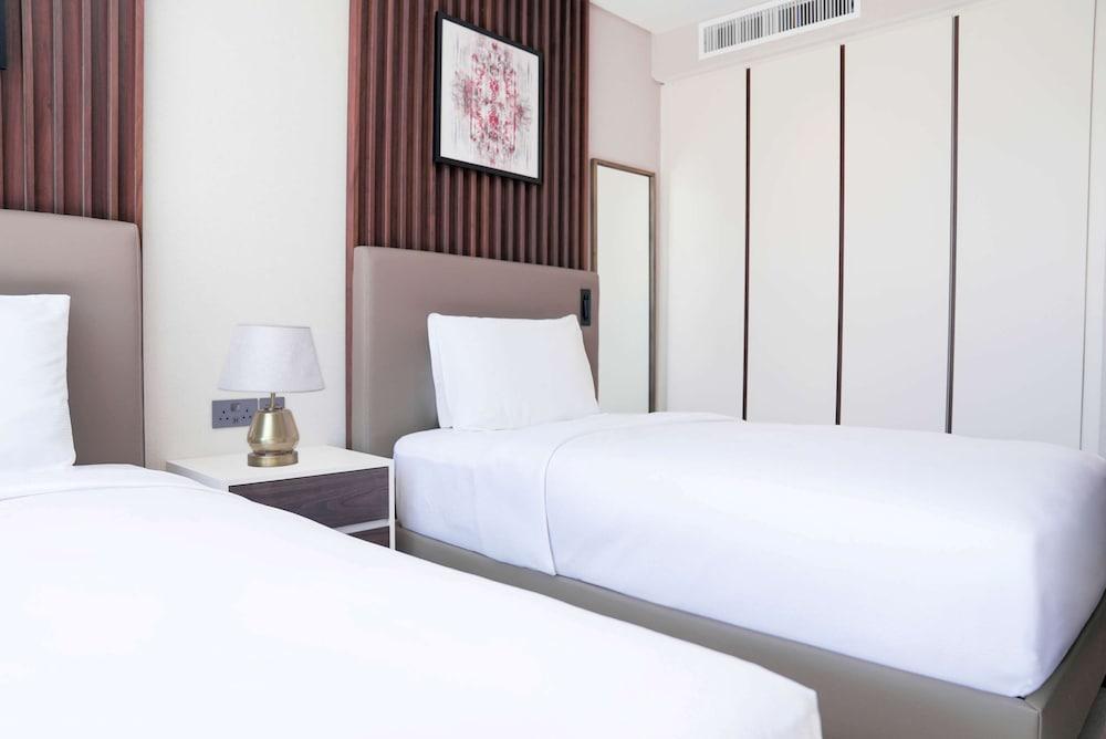 Doubletree by Hilton Amman Hotel & Residences Room Type - Superior Studio, 2 Double Beds, Balcony Doubletree by Hilton Amman Hotel & Residences Room Type - Superior Studio, 2 Double Beds, Balcony