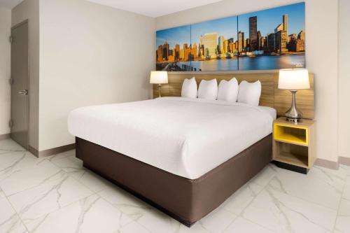Days Inn by Wyndham Staten Island - Tap to explore photos