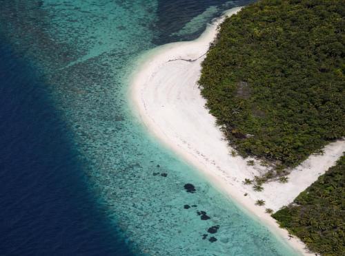 Suncoral Maldives - Tap to explore photos