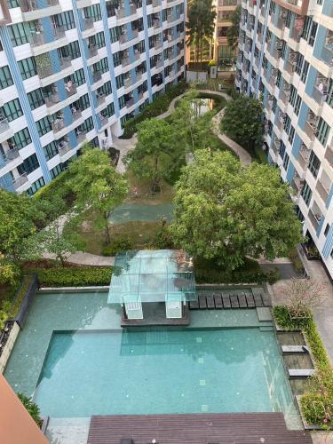 Centrio Condominiums Top Floor with Pool and Garden view - Tap to explore photos