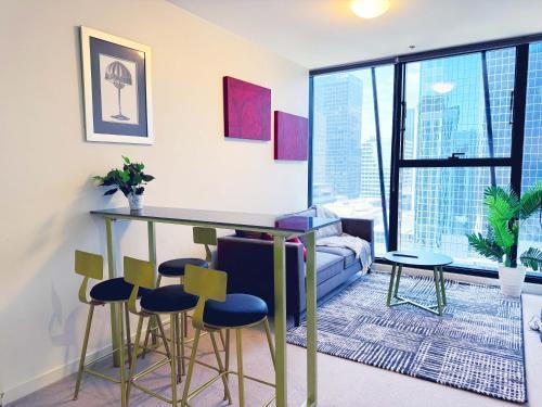 Collins Serviced Apartments - Tap to explore photos