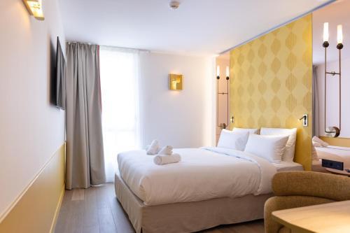 Hôtel Kyriad Prestige Paris Asnieres - Tap to explore photos