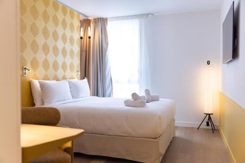 Hôtel Kyriad Prestige Paris Asnieres - Tap to explore photos