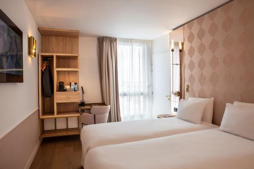 Hôtel Kyriad Prestige Paris Asnieres - Tap to explore photos
