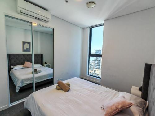3BR Heart of Wentworth Point with Views - Tap to explore photos