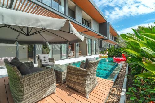 New 3BR Pool Villa Long One A5 with Chalong Bay view - Tap to explore photos