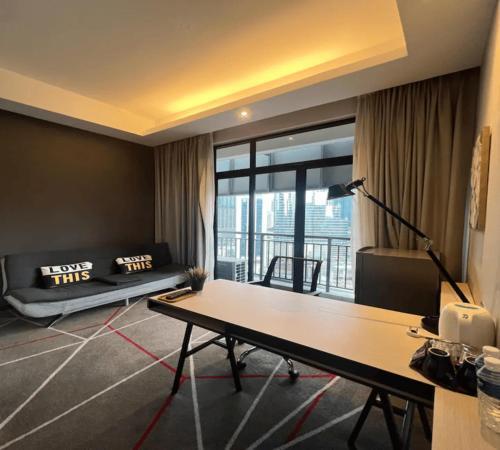 M101 Dang Wangi remote work-friendly suite - Tap to explore photos