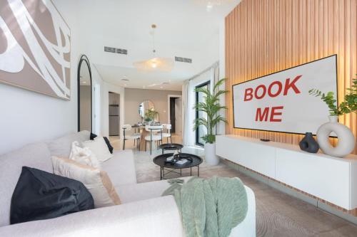 Gracious 1-Bedroom with City View at Square Tower in JVC - Tap to explore photos