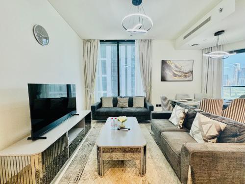 Elegant 2BR Escape in Sobha Waves Near Downtown - Tap to explore photos