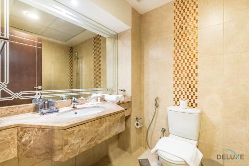 Delightful Studio at Al Madar Siraj Tower 1, Arjan by Deluxe Holiday Homes - Tap to explore photos
