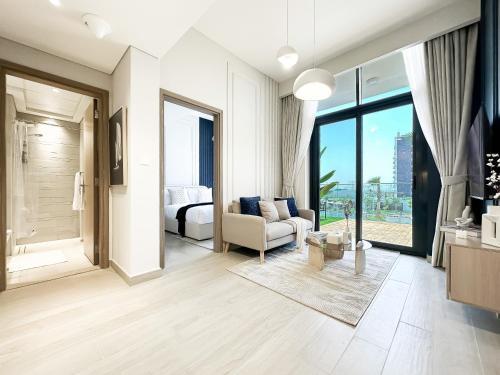 Exquisite 2BR Oasis w Pool View in Meydan - Tap to explore photos