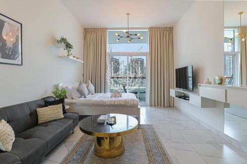 Royalton - Canal View Charm Studio in Binghatti Millennium - Tap to explore photos