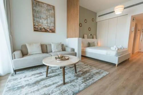 Cozy Chic Studio with Balcony The Greens Dubai - Tap to explore photos