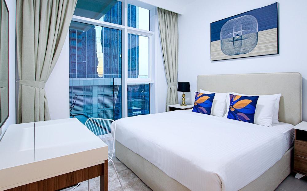 Sophisticated 2BR Apt in Business Bay’s Prime Location - Tap to explore photos